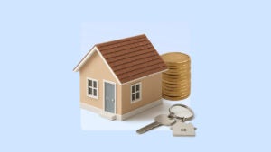 Picture of a house and keys next to a stack of coins.