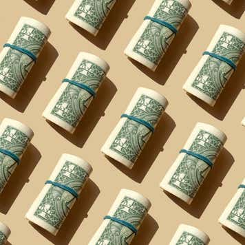 Several rolls of dollar bills