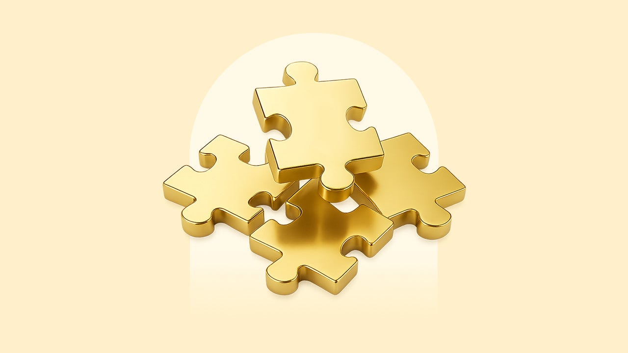 Gold puzzle pieces on a gold background