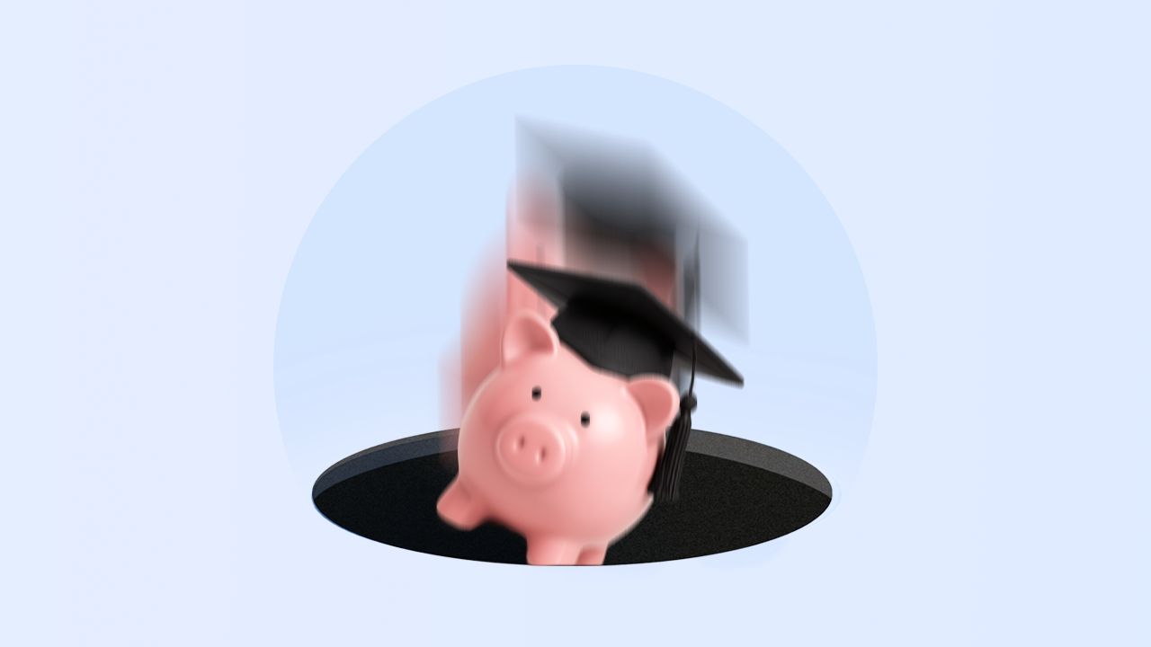 A piggybank with a graduation cap falling through a hole on a blue background.