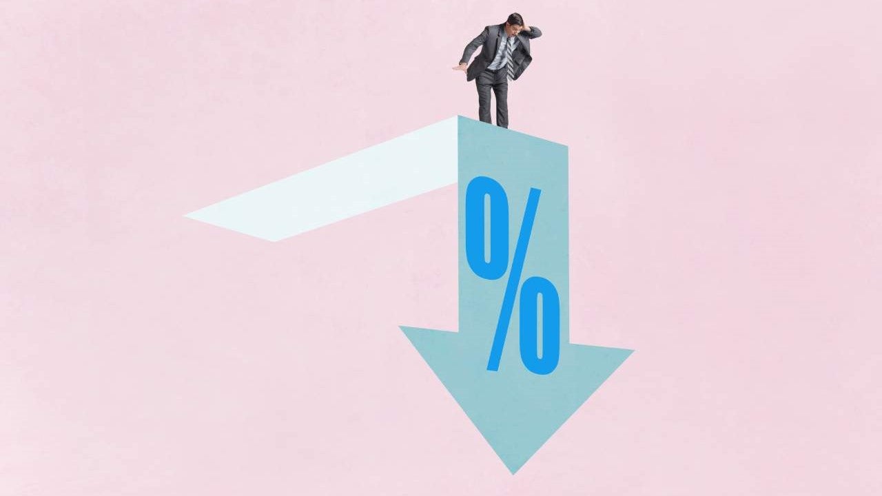 Artistic sketch of a businessman on a suspended platform looking down as the platform morphs into a downward arrow with a '%' symbol on its side.