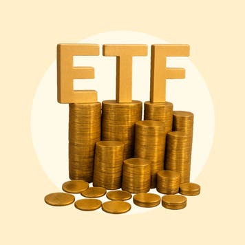 The letters ETF sit on top of a pile of coins on a yellow background.