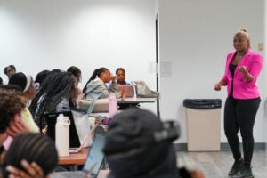 Ranyah Bullock, a senior at Delaware State University, speaks to students.