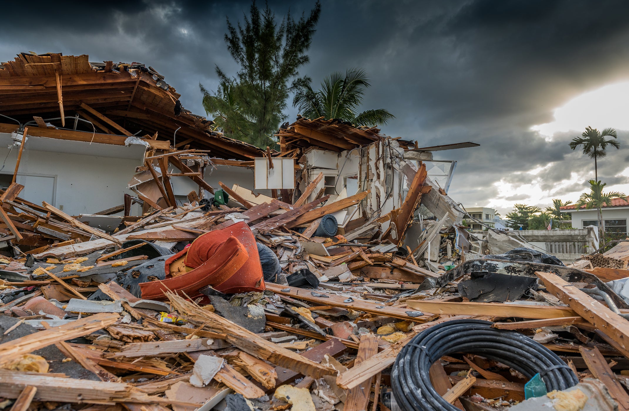 image of aftermath of severe hurricane damage to a house in florida