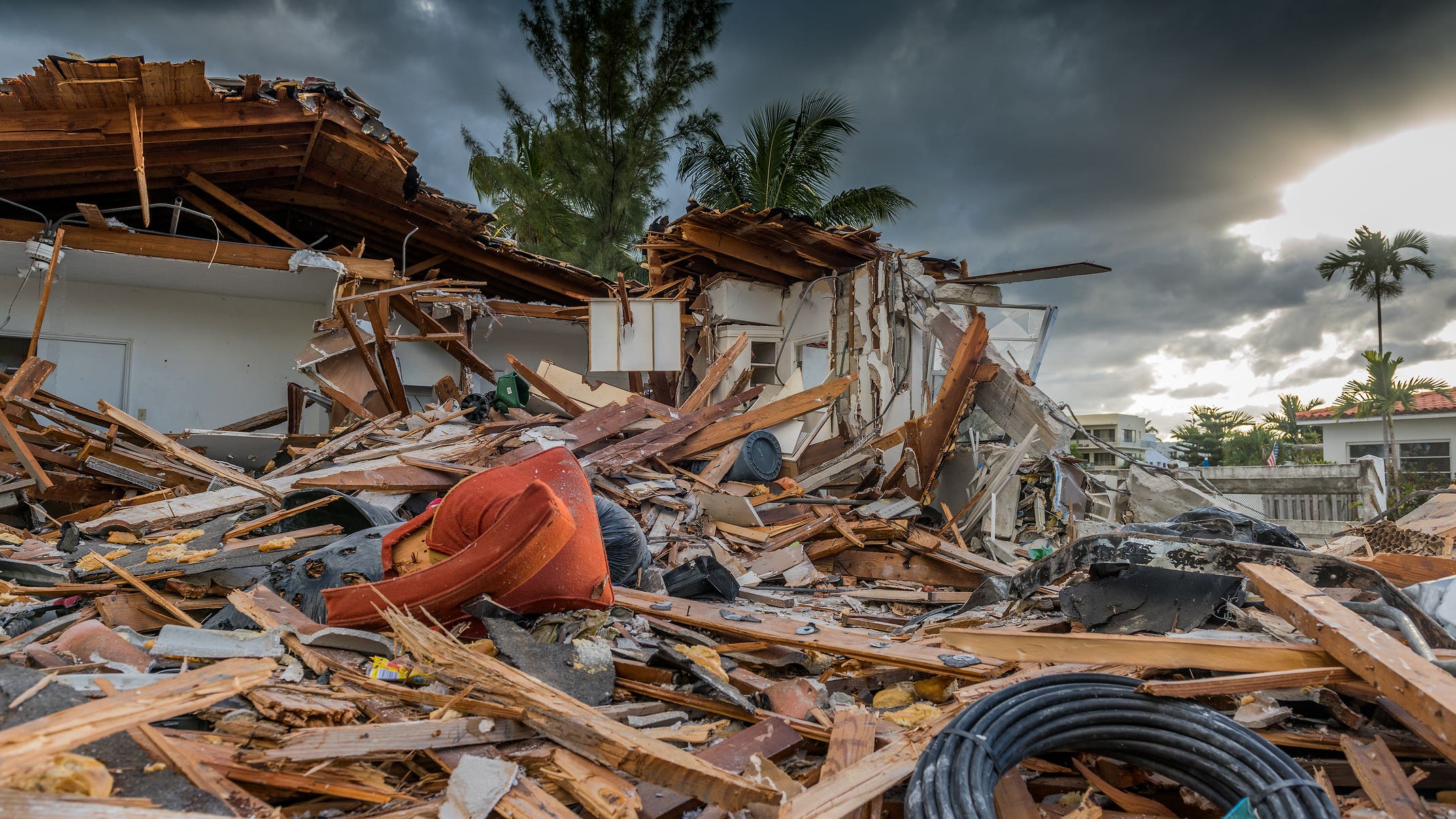 image of aftermath of severe hurricane damage to a house in florida
