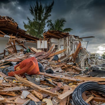 image of aftermath of severe hurricane damage to a house in florida