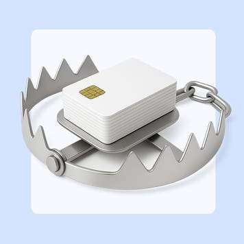 A graphic depiction of credit cards centered in a metal trap