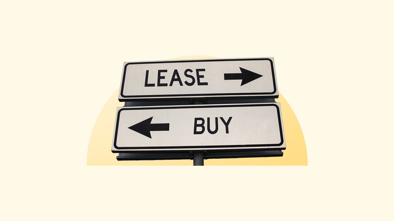 Sign with the word lease pointing right and the word buy pointing left.