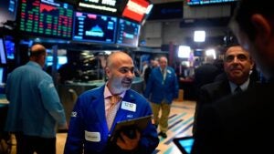 Bond traders on a trading floor.