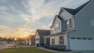 suburban homes with illustrated yellow sun in sky