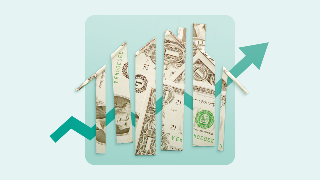 Torn-up dollar bills that create the shape of a house with an upward arrow in the background