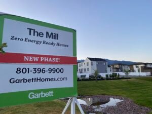 A sign advertising a new housing developement