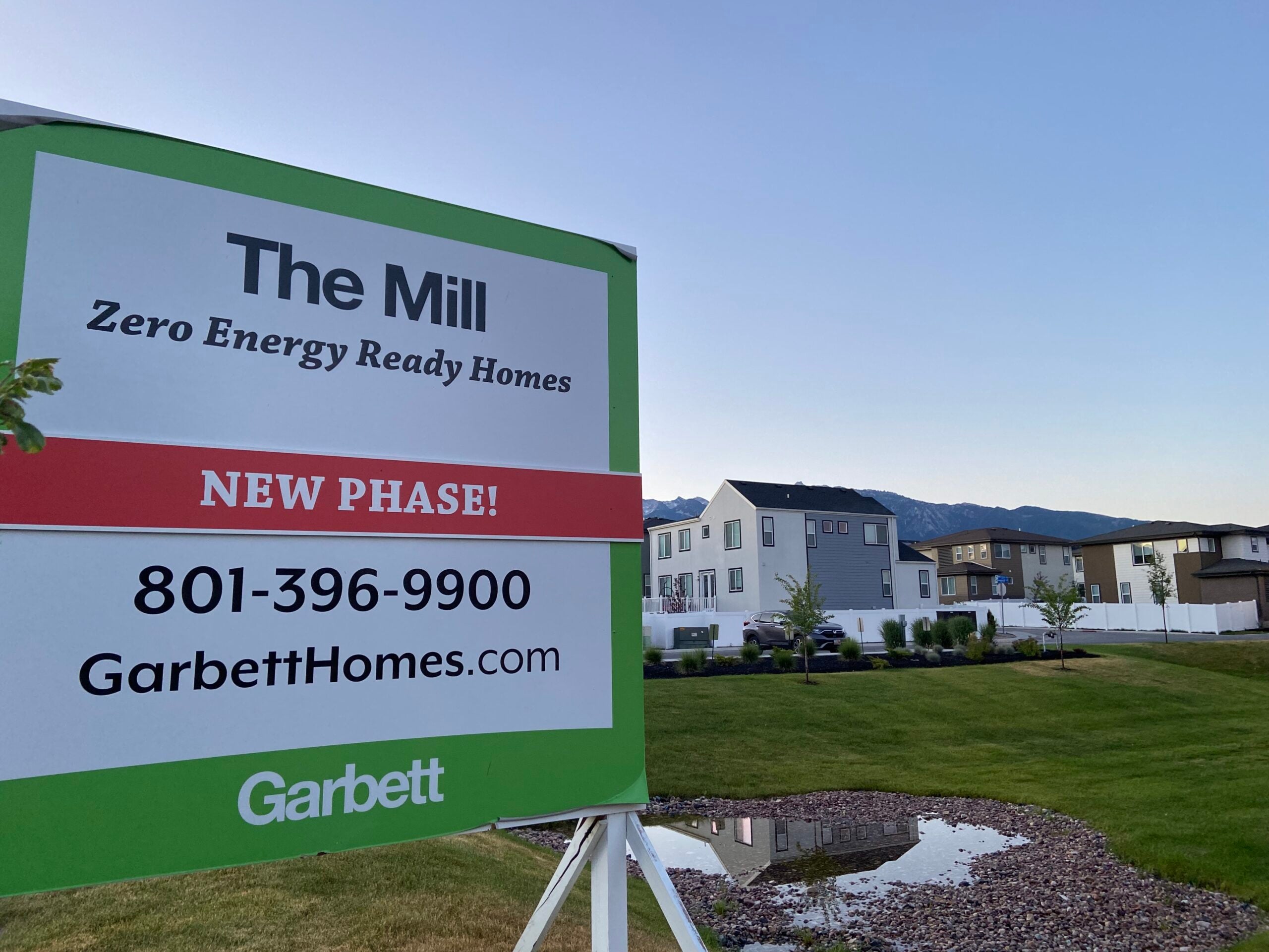 A sign advertising a new housing developement