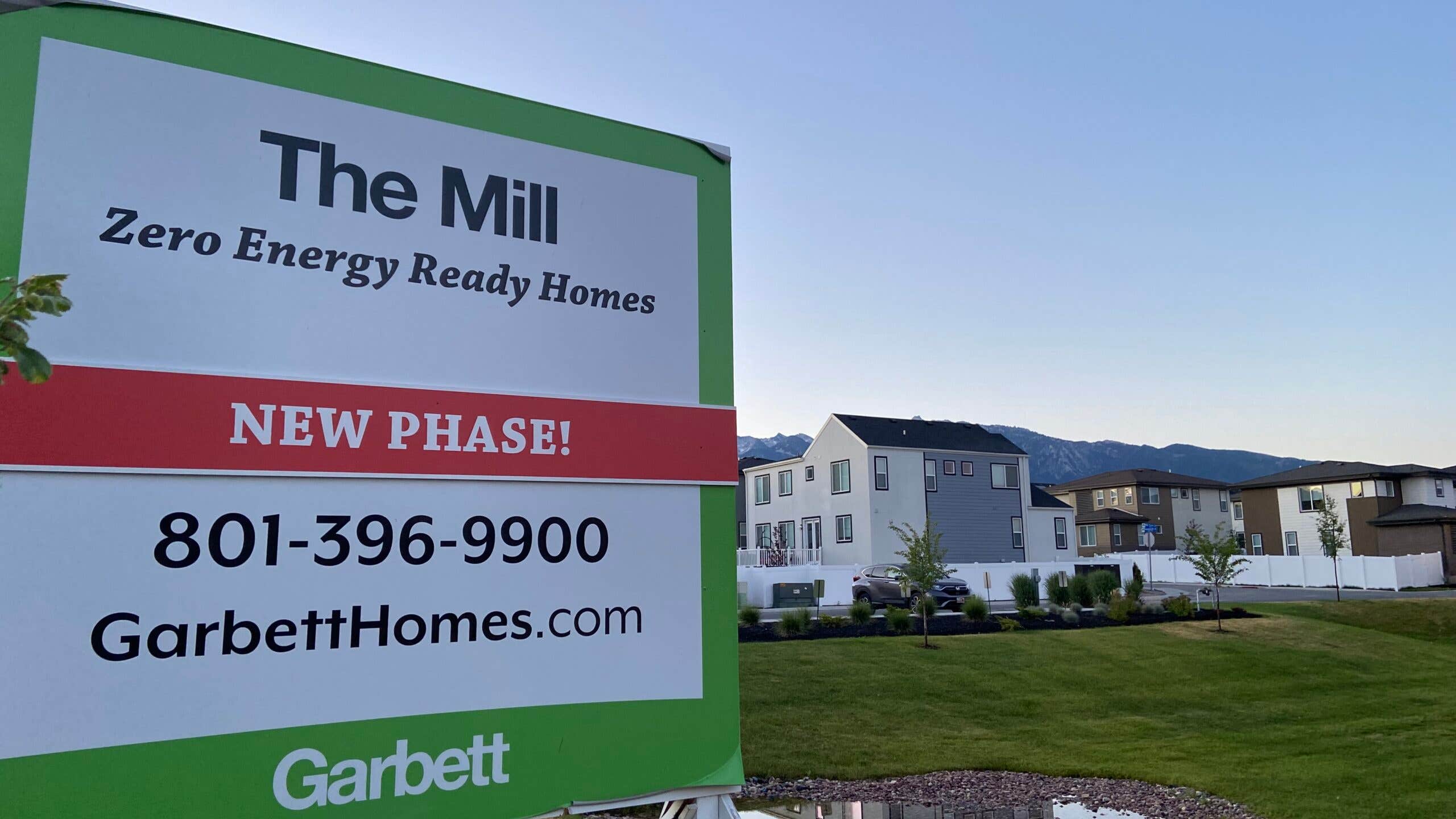 A sign advertising a new housing developement