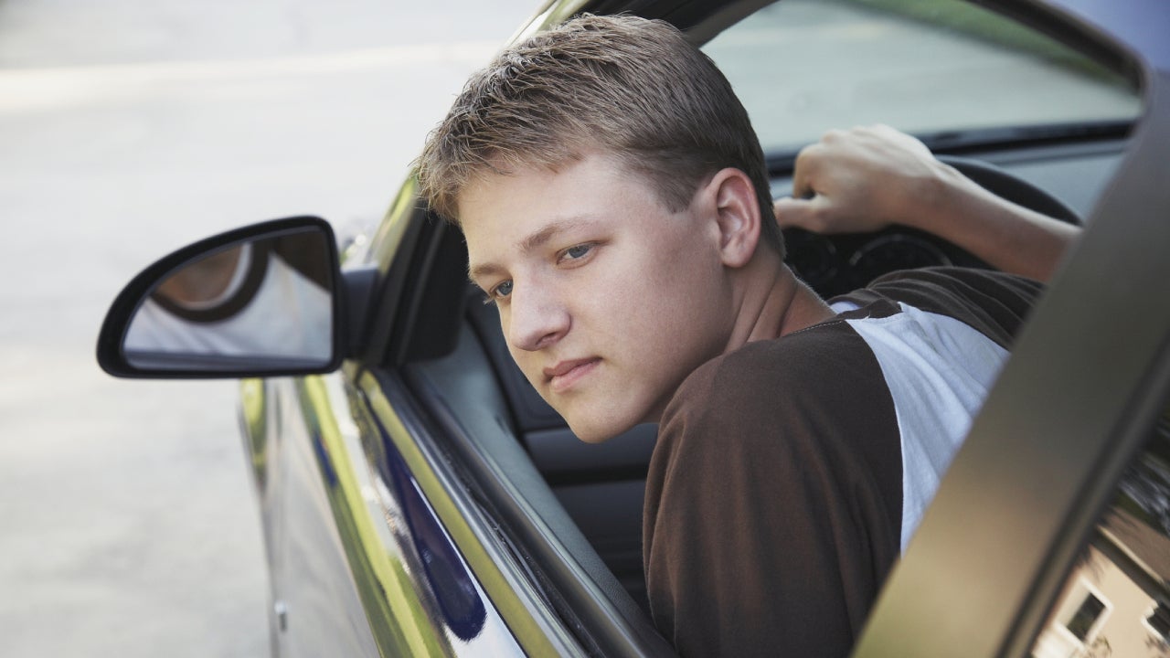 young man driving
