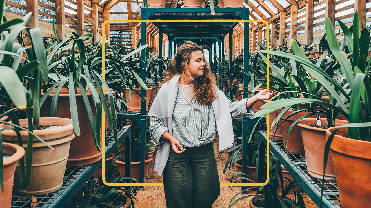 Girl with glasses using a computer and mouse