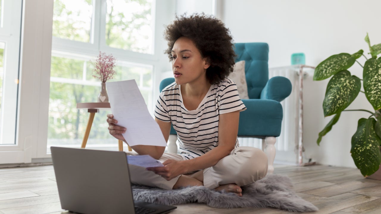 Woman paying bills online